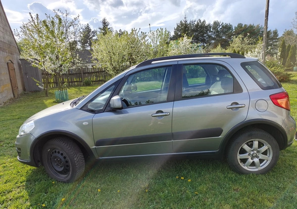 Suzuki SX4 cena 34500 przebieg: 135140, rok produkcji 2013 z Szczecinek małe 211